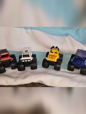 Lot Of 4 Soma 1998 Mighty Wheels Monster Trucks Flame Hummer Big Roller Van Jeep